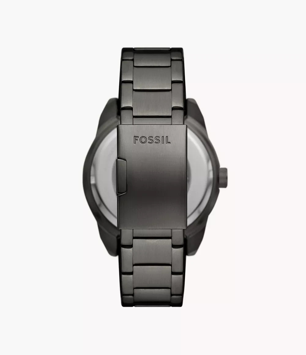 Fossil ME3255 back view – exhibition caseback revealing the automatic movement, paired with a smoke stainless steel bracelet – timeless style from HEY WATCH.