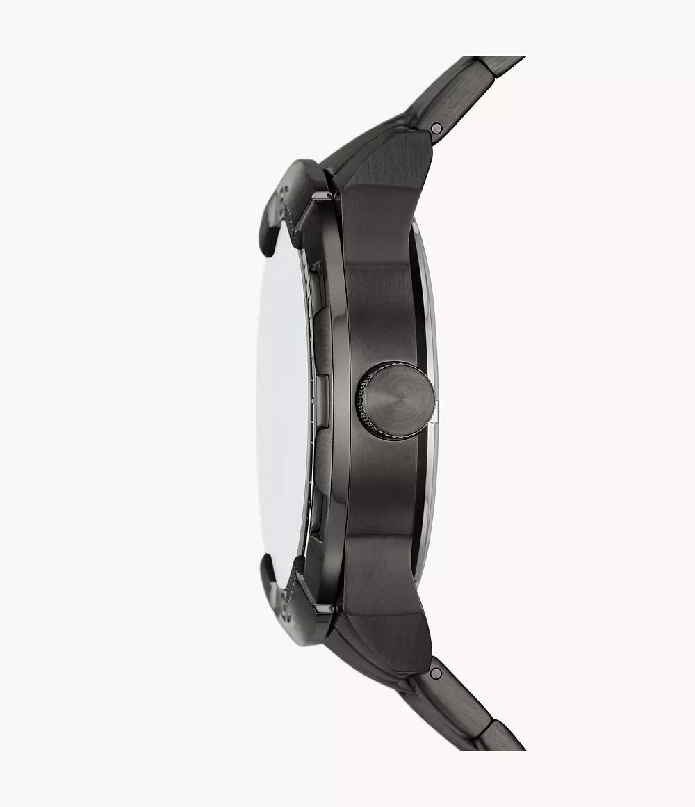 Fossil ME3255 side profile – sleek smoke stainless steel case with textured crown, showcasing the watch’s refined silhouette – premium craftsmanship by HEY WATCH.