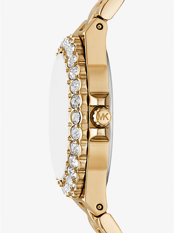 Michael Kors MK7395 side view – slim gold-tone stainless steel case with sparkling crystal bezel – elegant women's timepiece by HEY WATCH.