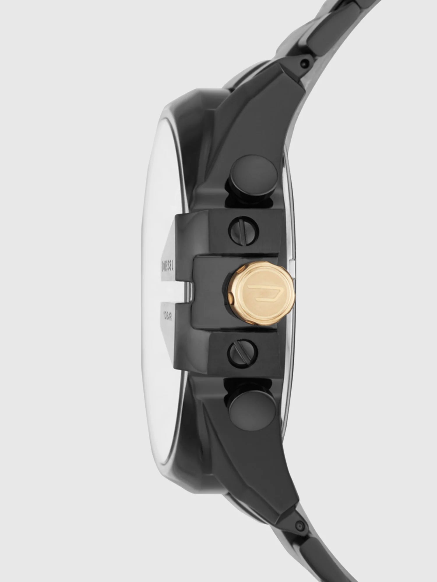 Diesel DZ4479 side profile – thick black and gold-tone stainless steel case with textured crown – bold men's watch available at HEY WATCH.