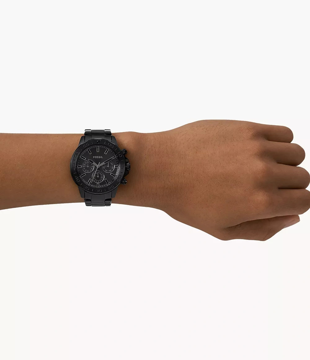 Fossil BQ2587 worn on wrist – black-on-black timepiece with minimalist dial and stainless steel bracelet – bold everyday style from HEY WATCH.