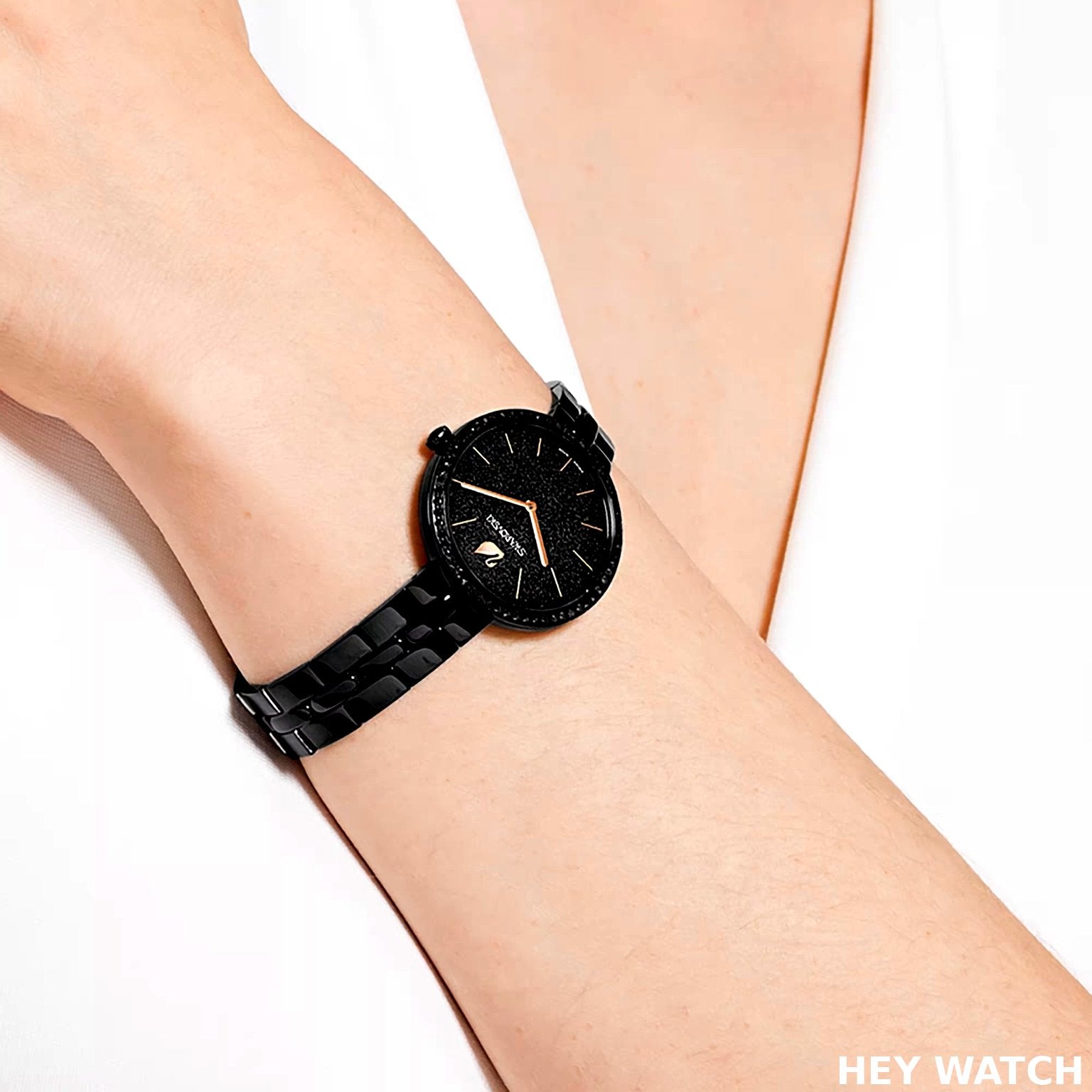 Swarovski Cosmopolitan women's watch worn on wrist – polished metal bracelet and crystal details for modern everyday sparkle – available at HEY WATCH.