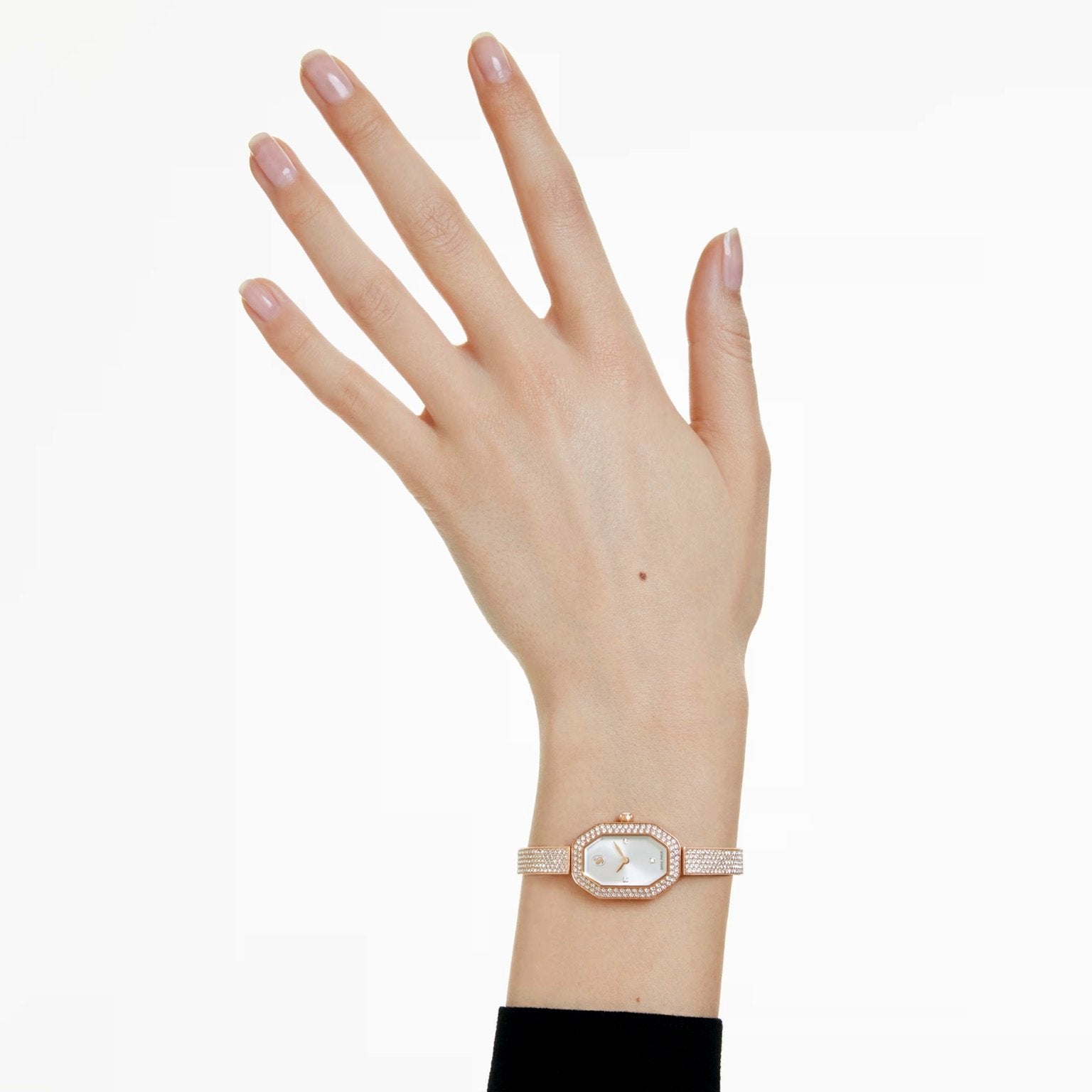 Swarovski Dextera Lux on wrist – silver-tone crystal chronograph worn by woman – dazzling Swiss timepiece styled for elegance – HEY WATCH.