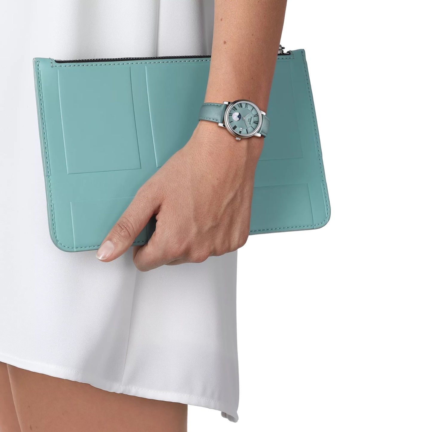 Tissot Bellissima Small Lady Moonphase on wrist – women’s moonphase watch with blue leather strap and mother-of-pearl dial – worn with style – HEYWATCH.