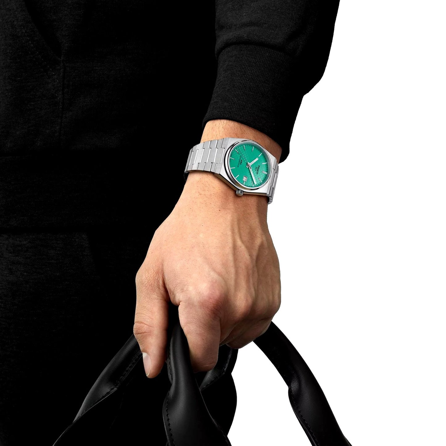 Tissot PRX Powermatic 80 on wrist – 40mm stainless steel watch with mint green dial worn with elegance – stylish Swiss automatic watch by HEY WATCH.